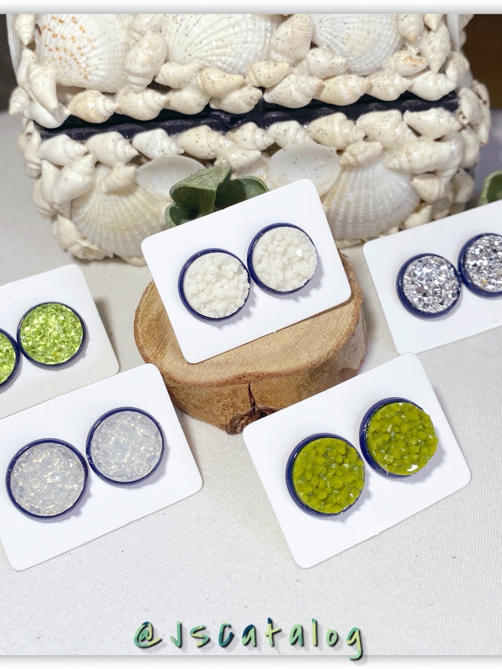 JSCatalog Clear and Cream Druzy Round Stud Earrings on Navy Trays